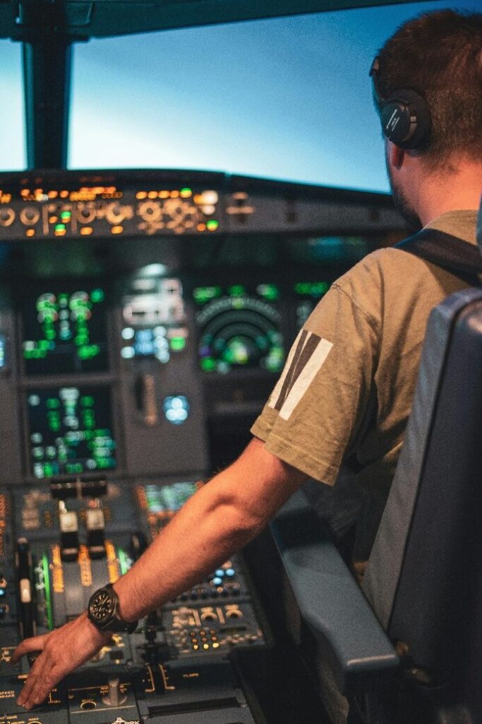 A student proudly holding an aircraft certification