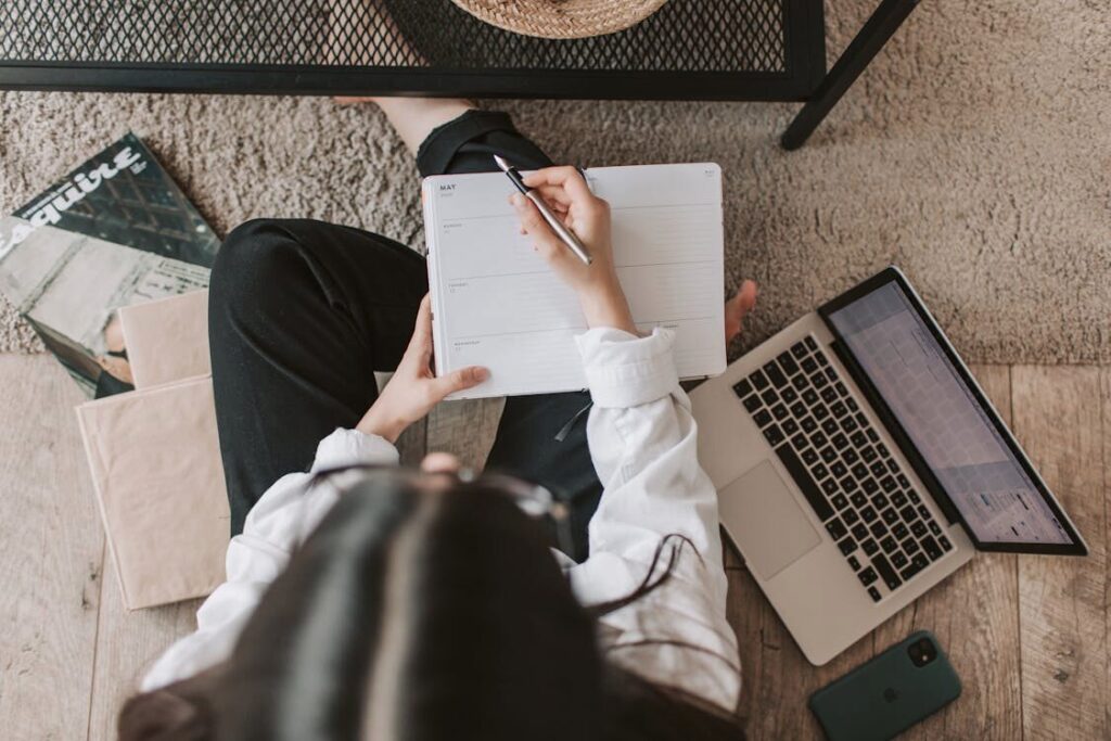 A student studying aircraft systems through an online aviation course on a laptop