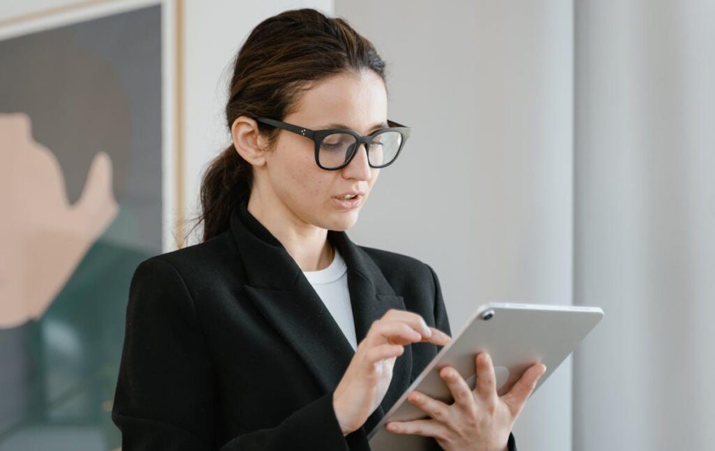 Aviation professional analyzing digital aircraft systems on a tablet
