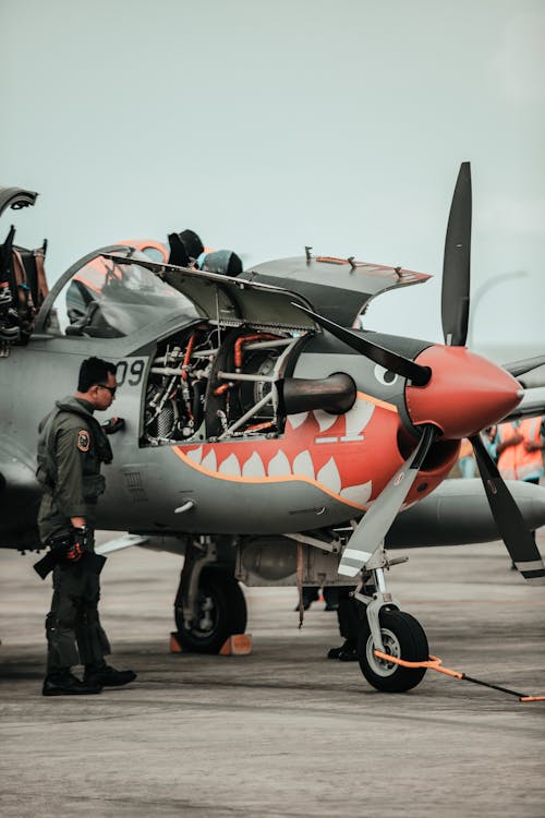 Aircraft technician performing maintenance on prototype