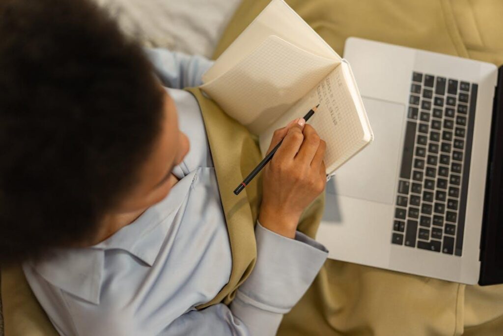 Student taking an online aviation training course at home