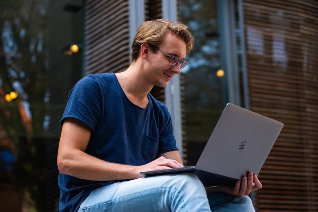 Student watching a digital aircraft familiarization module on a laptop