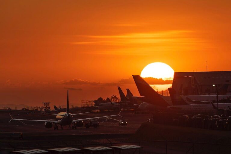 A Boeing 747 on the tarmac during sunset