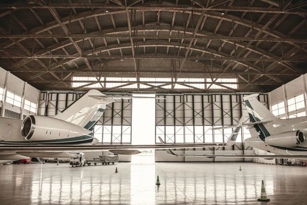 A modern hangar with advanced aircraft