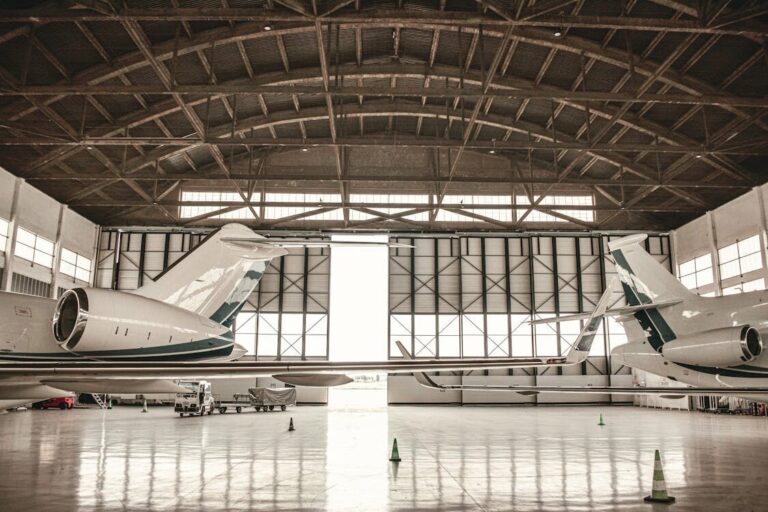 A modern hangar with advanced aircraft